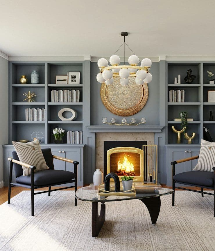 Living room with fireplace, bookshelves and globe chandelier