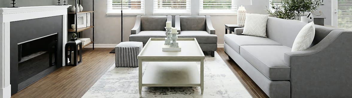 Bright living room with white sofas